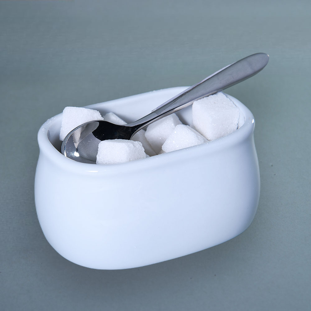 Porcelain sugar sachet holders in white – rectangular and curved design
